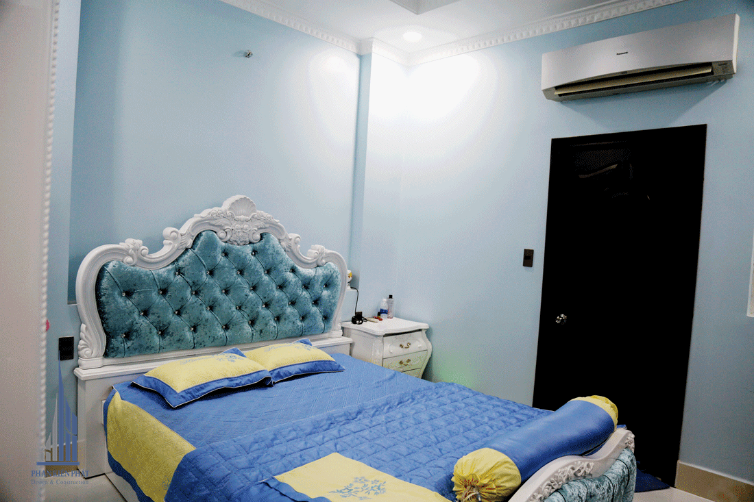 Phòng ngủ 1 được thiết kế với gam màu xanh tươi mát